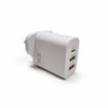 White power adapter for iphone and for samsung with multiple ports on a white wall