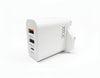 White power adapter with multiple USB ports on a desk