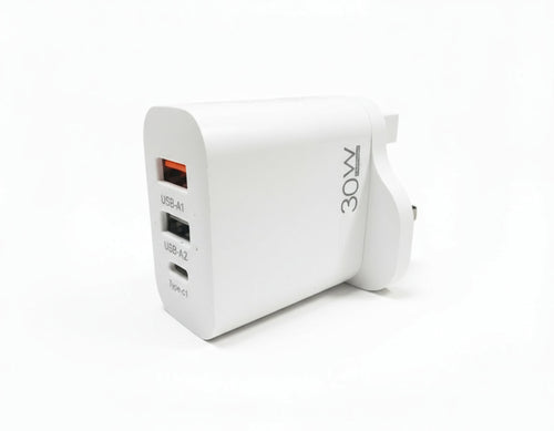 White power adapter with multiple USB ports on a desk