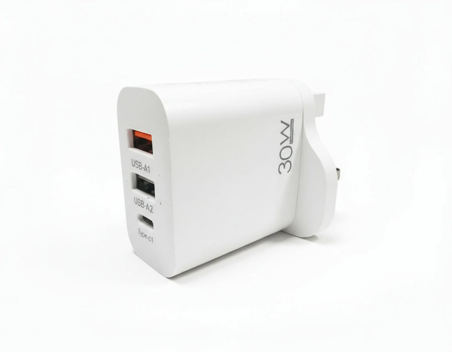 White power adapter with multiple USB ports on a desk