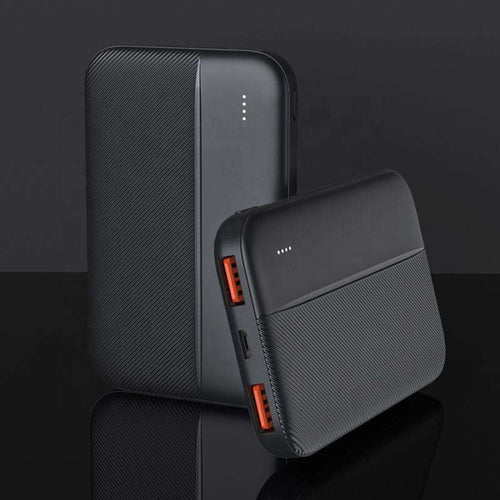Black power bank showing USB inputs and LED battery power indicator