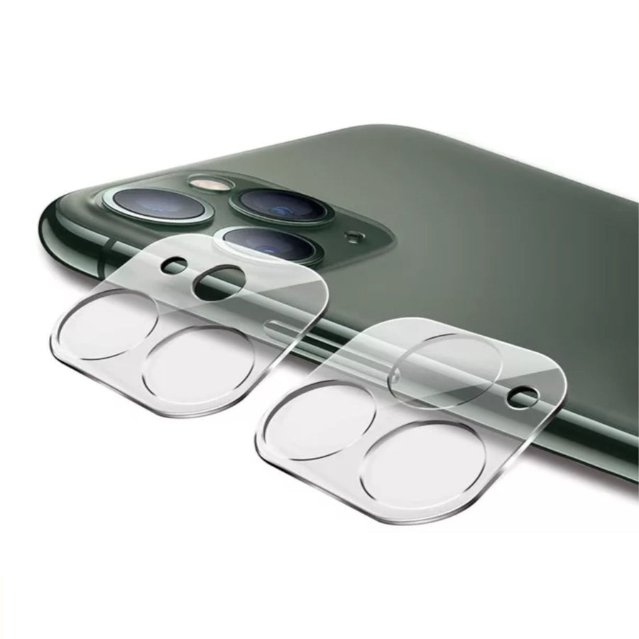 two camera protectors resting against the edge of an iphone