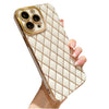 Gold and white phone case for iphone held by hand with nice nails