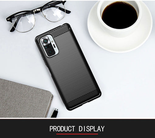 black rugged phone case made of tpu material for xiaomi redmi on white table next to glasses and coffe cup
