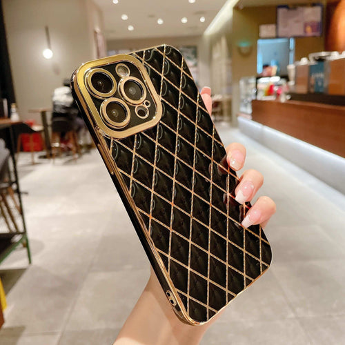 Black and gold phone case for iphone shown in restaurant